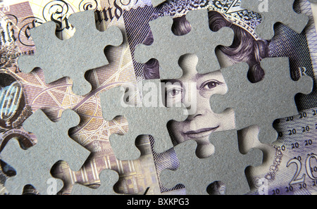 BRITISCHE ZWANZIG PFUND £20 QUEENS NOTENKOPF MIT PUZZLETEILEN RE FINANCE SAVINGS CREDIT GELDMÄRKTE WIRTSCHAFTLICHE KRISE ETC. UK Stockfoto