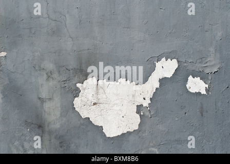 dunkel grau Farbe abplatzt eine Betonmauer (in der Form der chinesischen Karte) Stockfoto