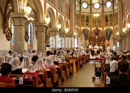 Messe in Jeondong Kathedrale, Jeonju Hanok Village, South Korea Stockfoto