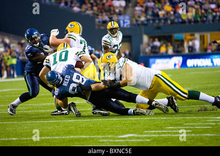 NFL-Football-teams der Seattle Seahawks spielen Grüne Bucht-Verpacker Stockfoto