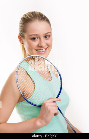 Porträt der attraktive Teenager-Mädchen mit Tennisschläger in der hand Stockfoto