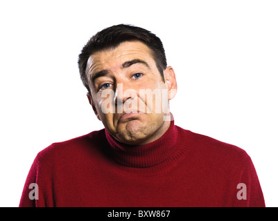 Kaukasische unwissender Mensch Shrugging schmollendes puckering Studioportrait auf isolierten weißen backgound Stockfoto