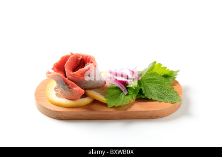 Matjes-Hering Filet mit Zitrone und Zwiebel Stockfoto