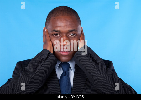 afrikanischen Geschäftsmann mit Händen, Ohren Stockfoto