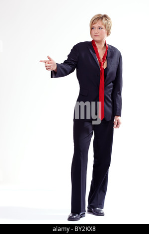 Junge Frau in einem Anzug Stockfoto