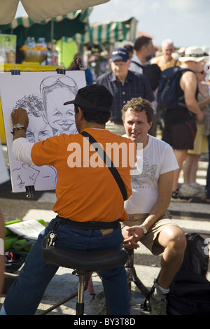 Künstler Zeichnung eine Karikatur auf dem Markt der Costa Adeje, Playa de Las Americas, Teneriffa, Kanarische Inseln, Spanien Stockfoto