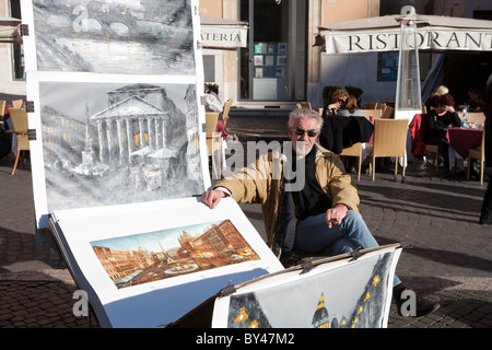 Streetart-Künstler Maler zeigen und verkaufen Gemälde in Piazza Navona-Rom Italien Stockfoto