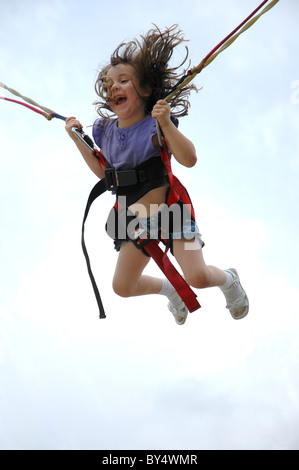 Pioneer Tage High Springs Florida Mädchen auf Bungee-Trampolin Stockfoto