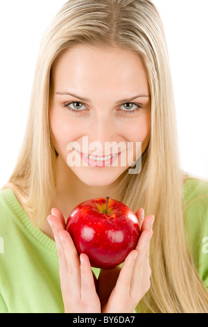 Gesunde Lebensweise - Frau mit roter Apfel auf weißem Hintergrund Stockfoto