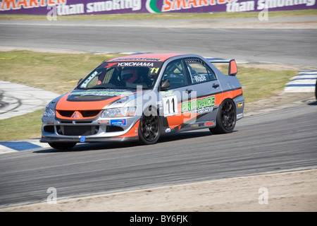 Australischer Rennfahrer, Kerry Wade, treibt seine IPRA-Spec "Mitsubishi EVO Kurve etwa in Perth Barbagallo Raceway Stockfoto