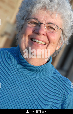 Senior, lächelnde Frau Stockfoto