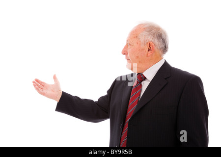 Geschäftsmann, das etwas mit seiner Hand (isoliert auf weiss) Stockfoto