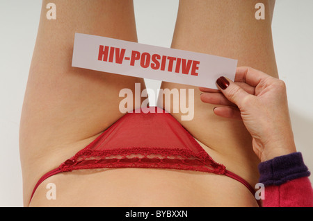 HIV Positive Mitteilung über den Körper einer Frau Stockfoto