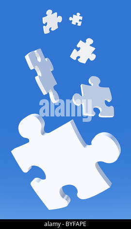 Puzzleteile, die vom Himmel fallen. Stockfoto