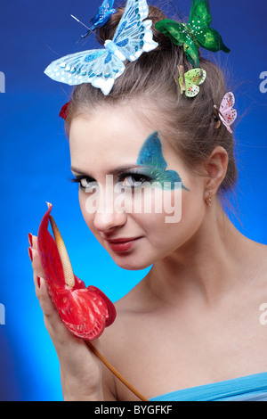 Modell mit Schmetterling bodyart Stockfoto