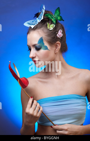 Modell mit Schmetterling bodyart Stockfoto