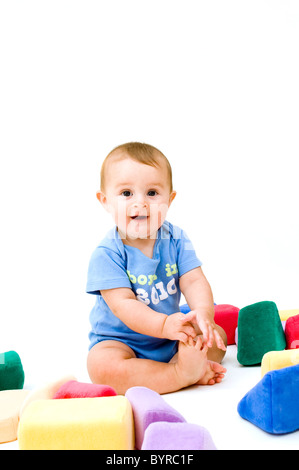 Baby mit Spielzeug, Isolated on White Background. Stockfoto