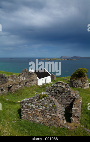 Restauriert und evakuierten Häuser auf Great Blasket Island, Blasket Islands, Halbinsel Dingle, County Kerry, Irland Stockfoto