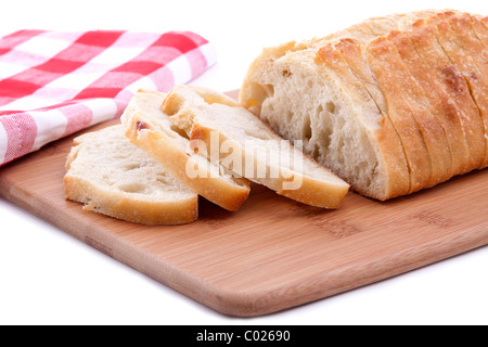 In Scheiben geschnitten Brot auf ein Schneidebrett Stockfoto