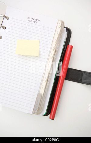 Filofax, Tagebuch mit Notepad und Haftnotizen Stockfoto
