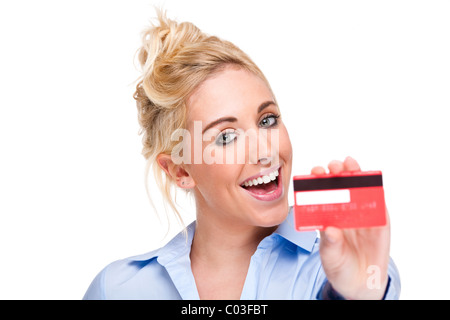 Attraktive junge Frau shopping mit Kreditkarte glücklich und lächelnd Stockfoto