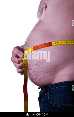 dicker Mann halten Sie ein Maßband um den Bauch Stockfoto
