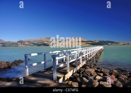 Holzsteg, Rapaki, Lyttelton Harbour, der Bank Halbinsel, Region Canterbury, Südinsel, Neuseeland Stockfoto