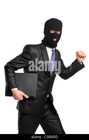 Ein Hacker in Raub Maske mit laptop Stockfoto