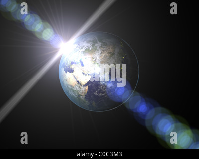 Erde aus dem Weltraum mit Sonnenaufgang Stockfoto