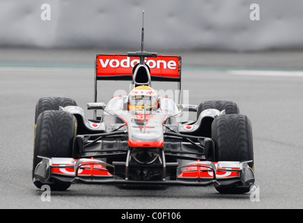 britische Formel1-Fahrer Lewis Hamilton im McLaren MP4-26 Rennwagen im Februar 2011 Stockfoto