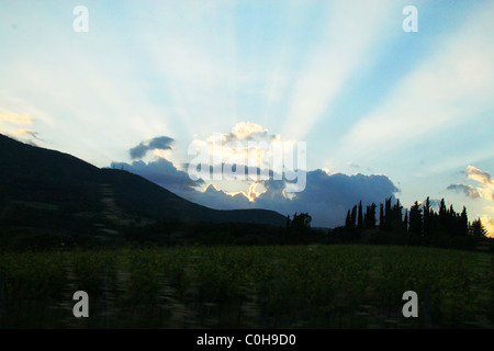 Sonne durch die Wolken, Toskana, Italien Stockfoto