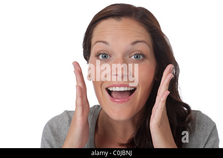 Überrascht junge glückliche Frau auf weißem Hintergrund Stockfoto