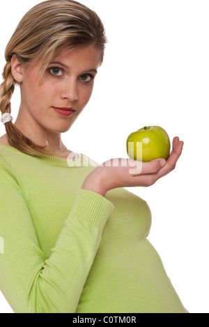 Frau mit grünem Apfel auf weißem Hintergrund Stockfoto