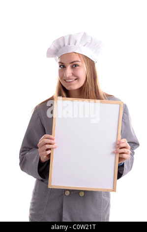 junge Köchin mit Ad Bord. Isoliert auf weiss Stockfoto