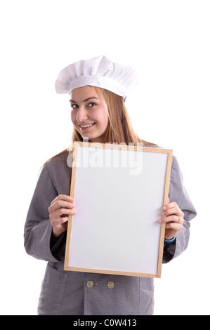 junge Köchin mit Ad Bord. Isoliert auf weiss Stockfoto