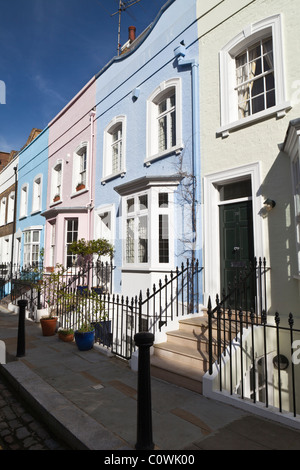 Eine Reihe von bunten georgische Häuser auf Bywater Street in Chelsea London England Stockfoto