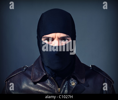 feinen Porträt des weißen Dieb mit schwarzer Sturmhaube Stockfoto