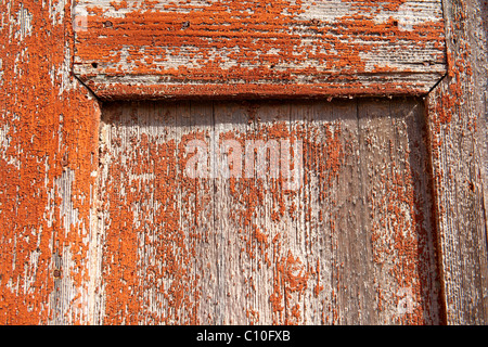 Orange abblätternde Farbe Hintergrund hautnah Stockfoto