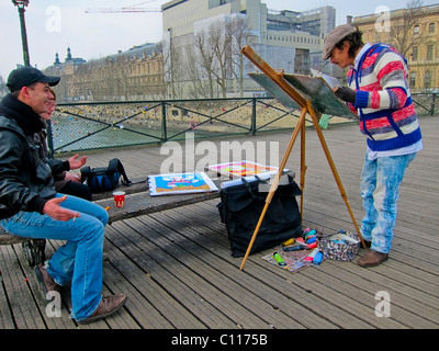 Paris, Frankreich, lokaler Künstler, Maler, Arbeiten an der Brücke an der seine, Pont des Arts, Kunstwerk Job Stockfoto