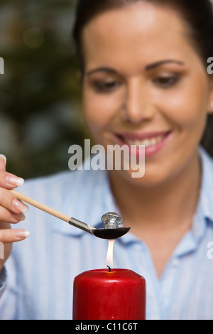 Silvester - führen gießen Stockfoto