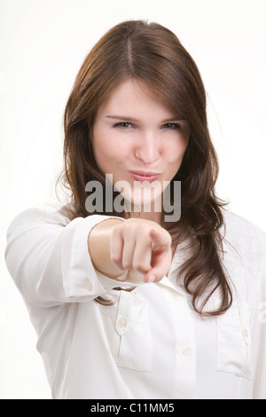 Frau zeigte mit dem Zeigefinger Stockfoto