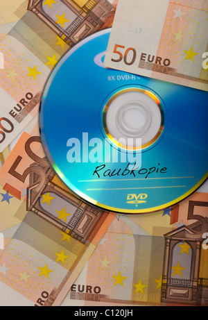 DVD, CD, Euro-Scheine, symbolisches Bild für ein Bootleg, Piraterie Stockfoto