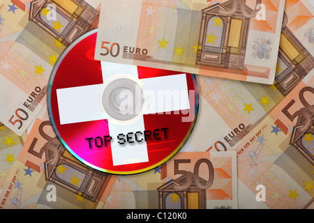 DVD, CD, Euro-Scheine, symbolisches Bild für den Kauf von Bankunterlagen, Steuerhinterziehung, Datenschutz, Bankgeheimnis, tax dodgers Stockfoto