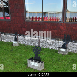 Bildnisse der Chilote Fabelwesen (Basilisco Caleuche zehn-zehn Vilu Coi-Coi Vilu), Gastgarten, Caulin, Chiloé, Chile Stockfoto