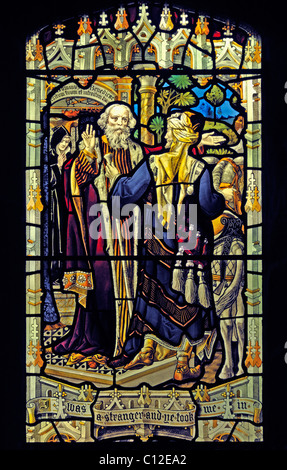 Taten der Nächstenliebe Fenster, (Detail). Kirche von Saint-Martin, Bowness-on-Windermere, Lake District National Park, Cumbria, England. Stockfoto