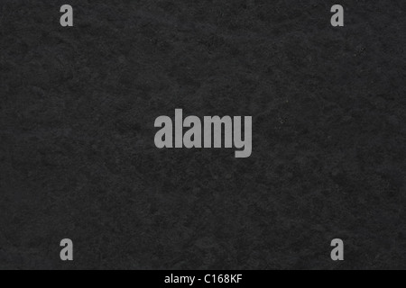 Dunklen grauen Hintergrund mit rauen Stein Textur Stockfoto