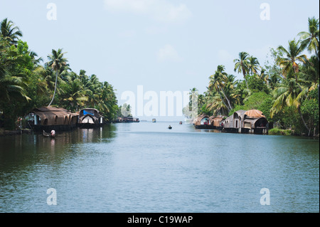 Hausboote in einer Lagune, Kerala Backwaters, Alleppey, Alappuzha Bezirk, Kerala, Indien Stockfoto