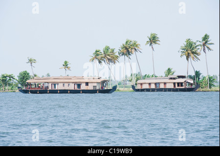 Hausboote in einer Lagune, Kerala Backwaters, Alleppey, Alappuzha Bezirk, Kerala, Indien Stockfoto