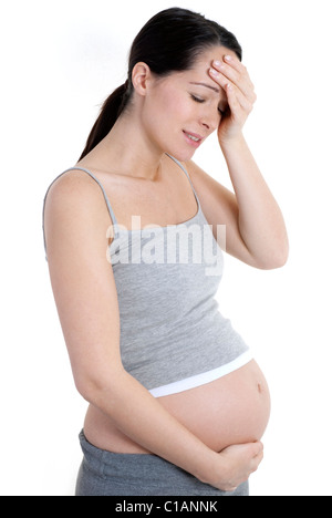 Schwangere Frau, die unter Kopfschmerzen leiden Stockfoto