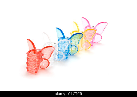 Disposit der Farbe Stifte für das Haar in Form des Schmetterlings Stockfoto
